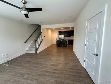Entrance foyer featuring dark hardwood / wood-styl