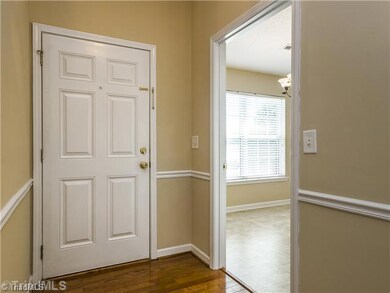 Entry. Tasteful features include neutral wall colors and flooring including new vinyl in the kitchen, baths and laundry