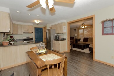 Dining area located in the eat in Kitchen.