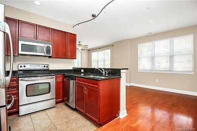 Well-Appointed Kitchen Opening to Living Room