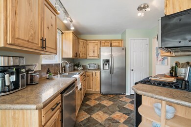 Gorgeous wood cabinets, ample counter space, and the gas range make this a perfect kitchen for cooking.