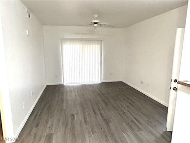 Spacious Living room with wood finished floors, ba