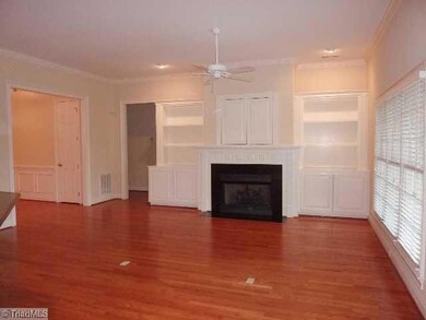 Living Room. Custom built-ins, TV nook, gas logs and plenty of natural daylight.