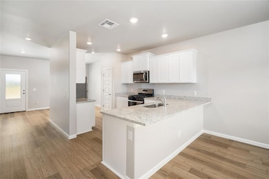 A chef’s dream kitchen with granite countertops, w