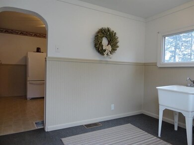 Laundry room/mud room located off the kitchen.