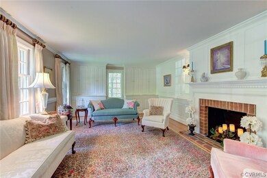 Living Room with Wood Burning Fireplace