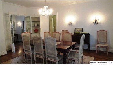 Spacious Dining Room has beautiful chandelier and 