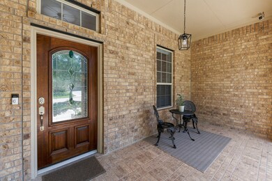 Enjoy a cup of coffee on your large porch while overlooking you beautiful garden.