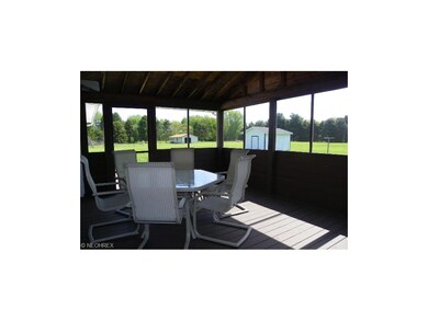 Screen porch with access from kitchen and backyard