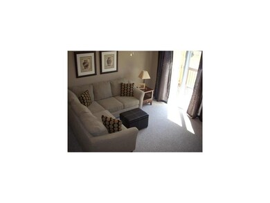 Living Room. Open living room with sliders to your
