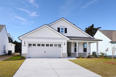 View of front of house featuring central AC unit, 