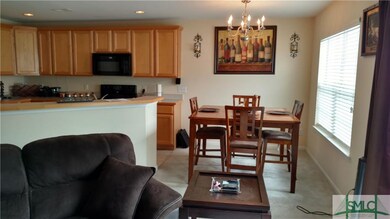 Kitchen, Dining, and Den are open