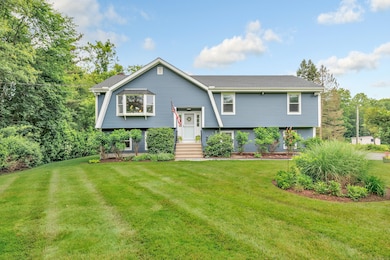 Oversized Raised Ranch with great curb appeal