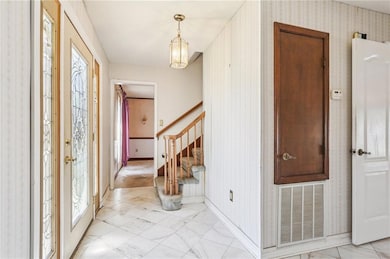 LARGE FOYER WITH MARBLE FLOOR