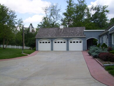 3 Car Garage with storage above