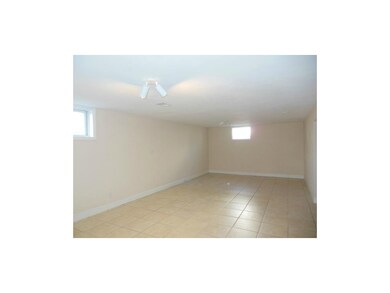 Spacious rec room, tile floor, full bath on this l
