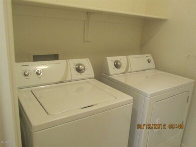 Inside laundry with washer:dryer
