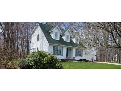 Classic Cape Cod in a neighborhood with sidewalks
