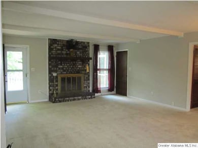 LARGE DEN WITH BRICK FIREPLACE,GASLOGS, AND GAS ST