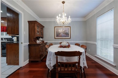 Dining space featuring wood finished floors, an in