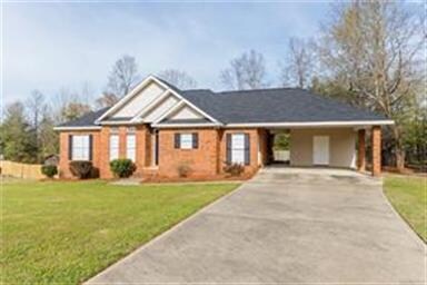 Front View of Home with Carport