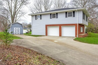 New garage doors.  Storage shed to hide more goodi