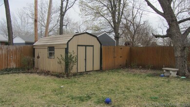 Storage building on a concrete base.
