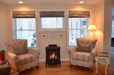 Parlor stove in the living room adds...