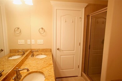Master bathroom/double vanity with shower and gard