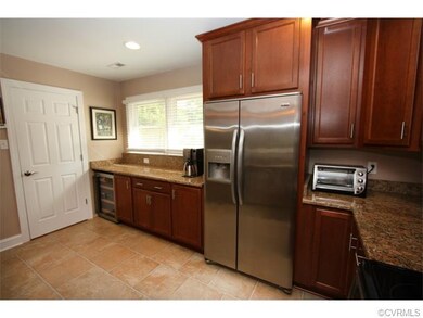 Kitchen features walk in pantry and wine cooler th