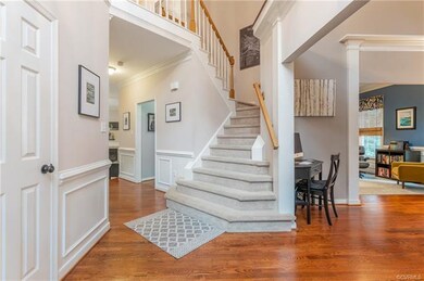 Foyer & staircase (Hardwood Floors down)