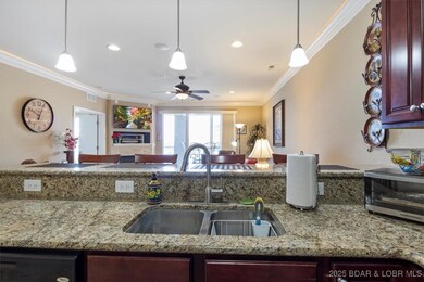 Custom cabinetry with Crown Molding, SS Appliances