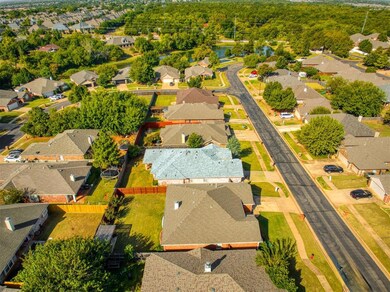 Looking West, toward neighborhood pool and pond.