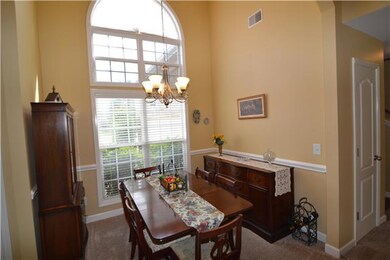 Closeup of the formal dining with arched window