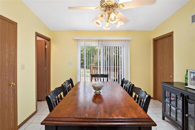 Nice size dining room, heated tile floors, door on