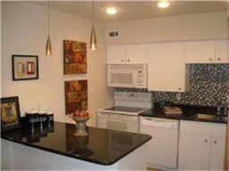 Kitchen with granite counter and Mosaic Back splas