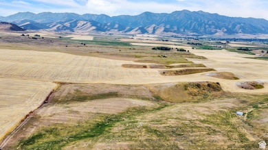 View of mountain background featuring rural landscape