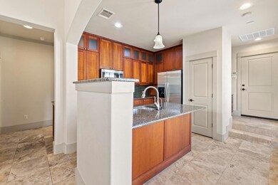 Kitchen with appliances with stainless steel fini