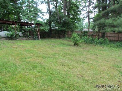 View from yard to carport
