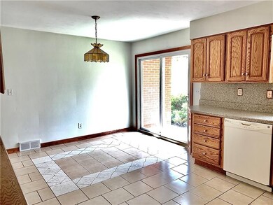 The dining area of the kitchen is spacious andLook