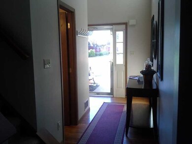 Entry/Foyer. Enter the home thru this gorgeous 2 story foyer! Very bright and cheerful and not to mention beautiful hardwood floors give this home a very warm and welcoming entry!