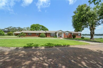 One story brick ranch with circular drive