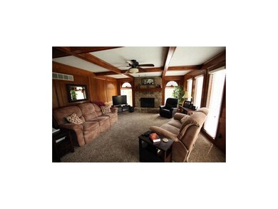 Large Great Room With Stone Fireplace, Wood Beamed