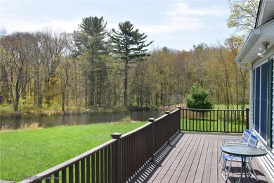 Beautiful wrap around deck overlooking the pond an