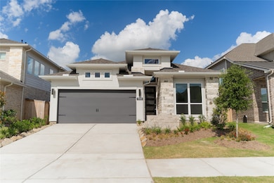 This modern home features a sleek exterior with a
