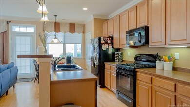 Plenty of prep space, gas cooking and bar seating.