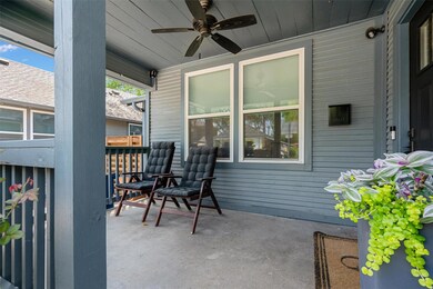 View of patio with covered porch and a ceiling fan