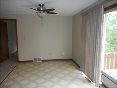 Dining room with sliding door to the right leading