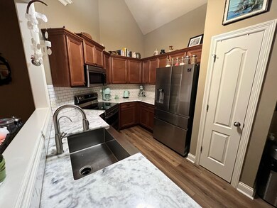 Totally updated!! Newly installed gorgeous granite, new SS farmhouse sink and new lights.  Tons of counterspace!