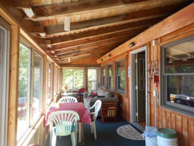 150' on S. Manistique lake with log cabi